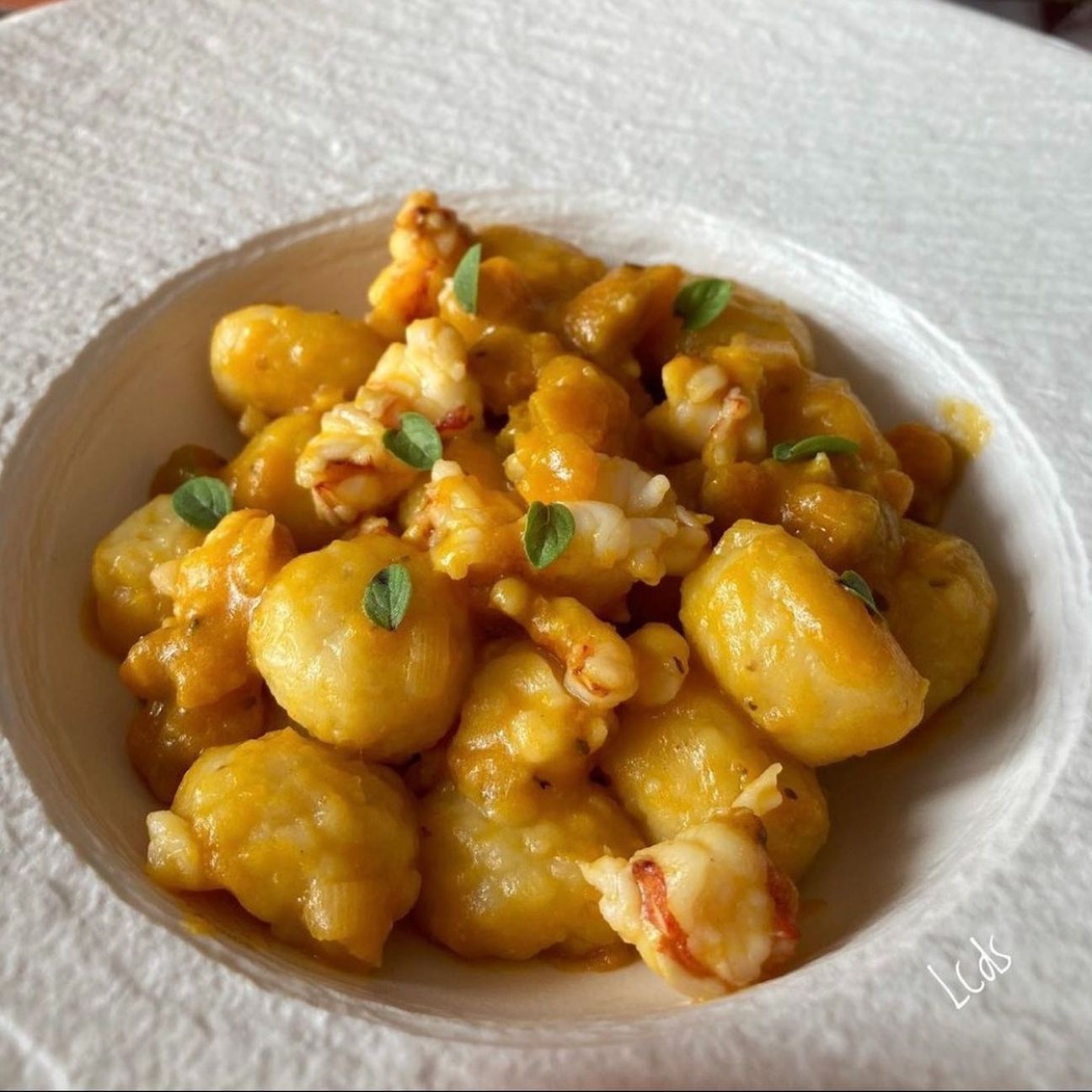 Gnocchi di patate con zucca e gamberoni