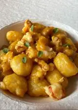 Ricetta Gnocchi di patate con zucca e gamberoni