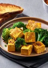 Ricetta Tofu al curry con broccoli e pane tostato