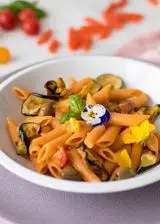 Ricetta Penne di lenticchie con melanzane pomodori e olive