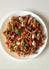 Ricetta Fusilli di piselli e lenticchie rosse, pomodorini, mozzarella, rucola e basilico