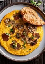 Ricetta Frittata con funghi e pane croccante