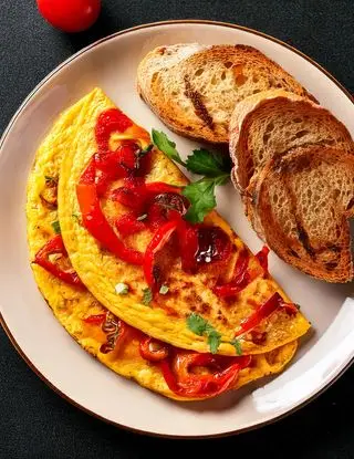 Ricetta Omelette con peperoni grigliati con pane croccante di heltamain