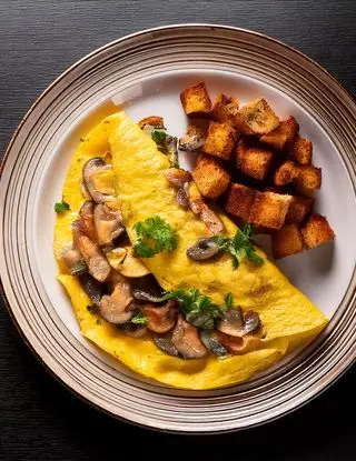 Ricetta Omelette con funghi e crostini di heltamain