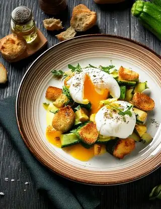 Ricetta Uova in camicia con zucchine e crostini di eltamain