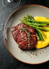 Ricetta Bistecca di manzo con polenta e asparagi