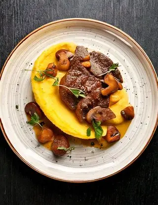 Ricetta Fettina di Vitello con Polenta e Funghi di heltamain