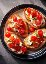 Ricetta Crostini con robiola e pomodorini