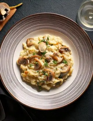 Ricetta Risotto alla robiola e funghi di heltamain