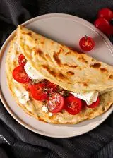 Ricetta Piadina con robiola e pomodorini