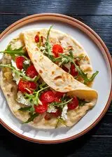 Ricetta Piadina con ricotta, pomodori e rucola