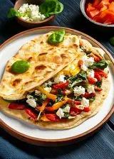 Ricetta Piadina con feta, spinaci e peperoni arrostiti