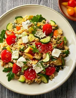 Ricetta Insalata di riso con feta, zucchine e pomodori di heltamain