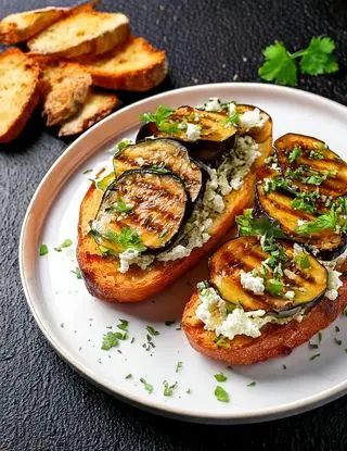 Ricetta Bruschette con feta e melanzane grigliate di heltamain