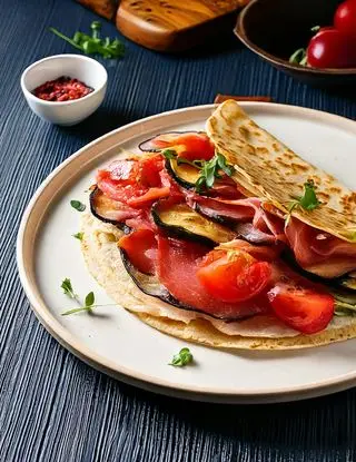 Ricetta Piadina con Bresaola, melanzane grigliate epomodorini di heltamain