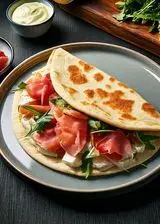 Ricetta Piadina con prosciutto crudo, robiola e rucola