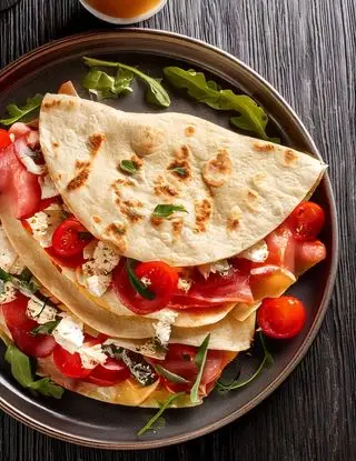 Ricetta Piadina con feta, bresaola e pomodori di heltamain