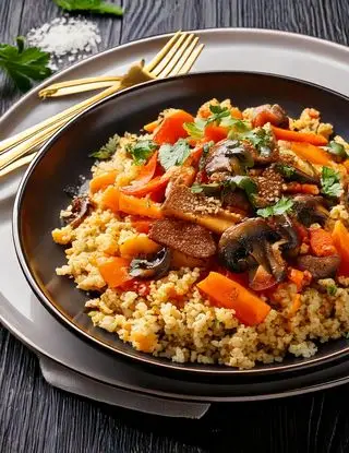 Ricetta Cous cous con Tempeh, Funghi e carote di heltamain