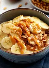 Ricetta Yogurt bowl con banana, cereali e burro d'arachidi