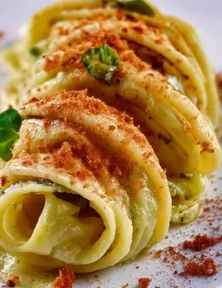 Ricetta Spaghetti crema di broccolo e polvere di crudo croccante di heltamain