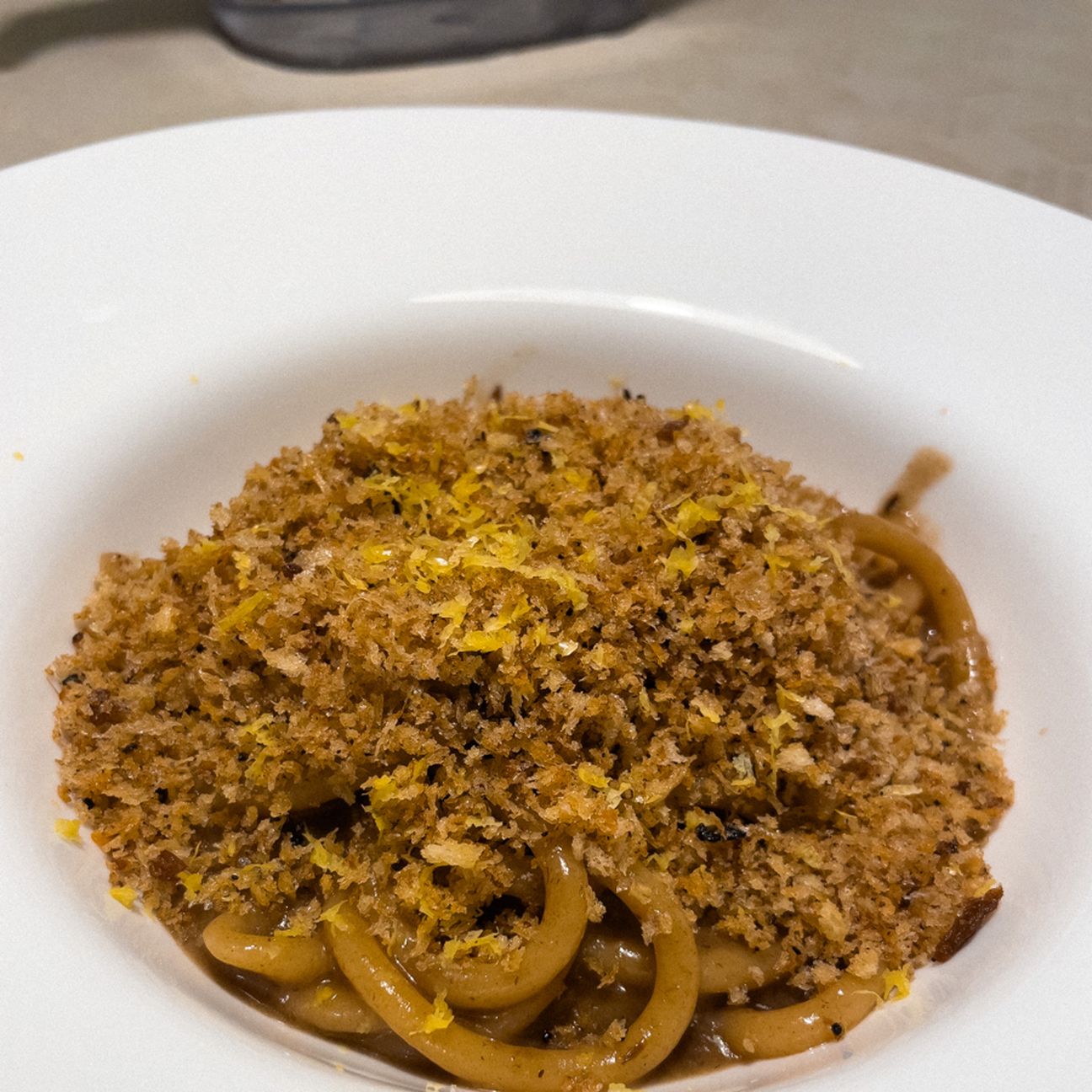 Pici, aglio nero e alici