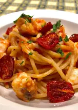 Ricetta Spaghettoni con rana pescatrice e pomodorini al forno