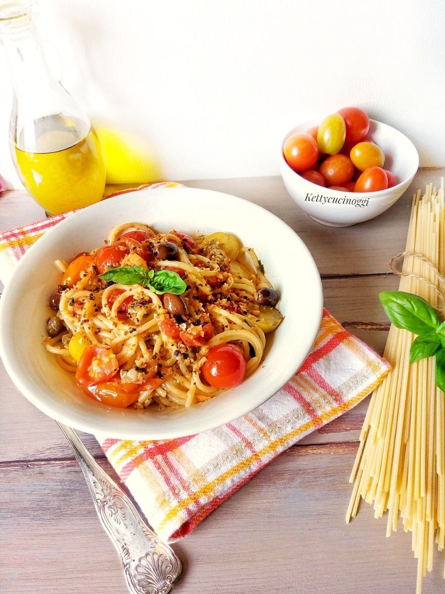 SPAGHETTI AMMUDICATI AI QUATTRO POMODORINI