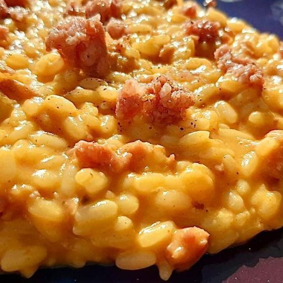 Risotto con crema di zucca e norcia
