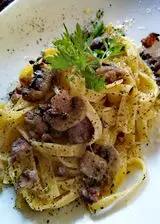 Ricetta Tagliatelle con funghi e salsiccia