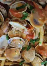 Ricetta Bucatini con vongole e moscardini