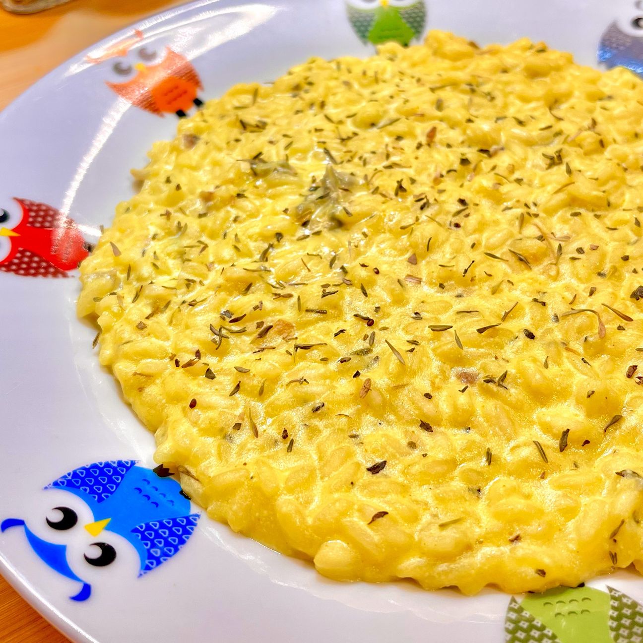 Risotto ricotta, gorgonzola, grana con erbe aromatiche e curcuma