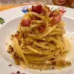 Ricetta Spaghetti aglio, olio, peperoncino, crema di grana, pane aromatizzato, pancetta
