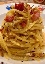 Ricetta Spaghetti Garofalo aglio, olio, peperoncino, crema di grana, pane aromatizzato, pancetta