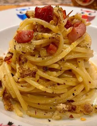 Ricetta Spaghetti Garofalo aglio, olio, peperoncino, crema di grana, pane aromatizzato, pancetta di giadaconti