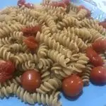 Ricetta Fusilli integrali al sapor di alici e pomodorini