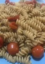 Ricetta Fusilli integrali al sapor di alici e pomodorini