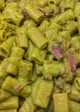 Ricetta Rigatoni con crema di asparagi, fonduta di parmigiano e speck croccante