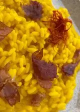 Ricetta Risotto allo zafferano con bacon al prosciutto crudo