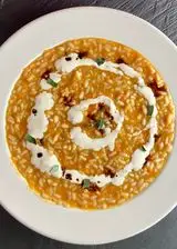 Ricetta Risotto con Zucca, Crema di Pecorino e Aceto Balsamico Invecchiato.