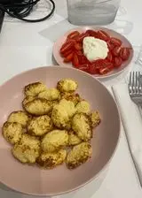 Ricetta Gnocchi di cavolfiore al forno, stracchino e pomodorini