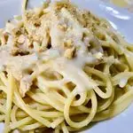 Ricetta Spaghetto con crema di pomodorini gialli, gorgonzola e tarallo