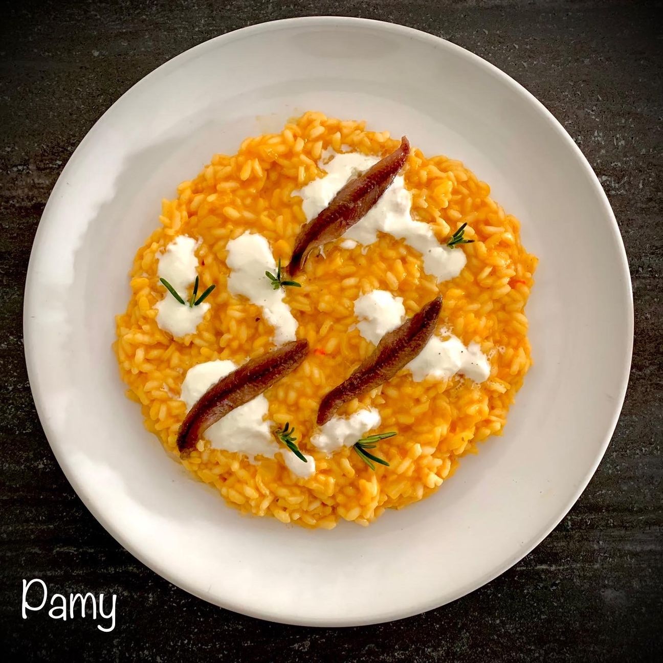 Risotto peperoni, crema di bufala e alici