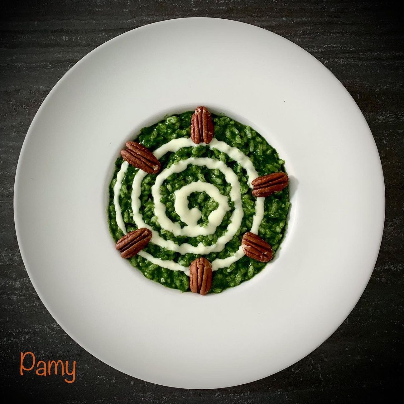 Risotto spinaci, noci pecan, fonduta di casera valtellinese