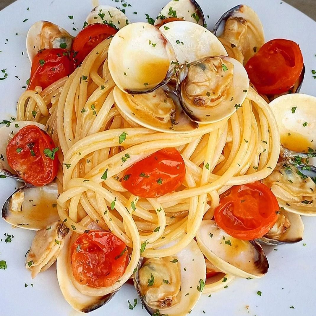 Spaghetti con Pomodorini e Vongole.