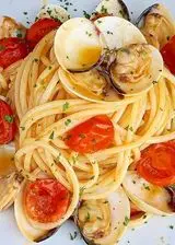 Ricetta Spaghetti con Pomodorini e Vongole.