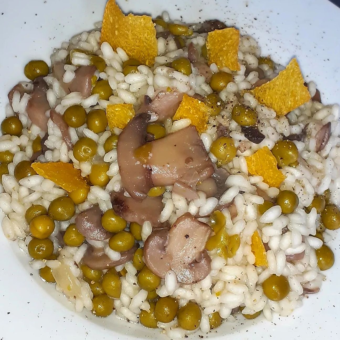 Risotto con Funghi, Piselli e Sfoglie di Mais