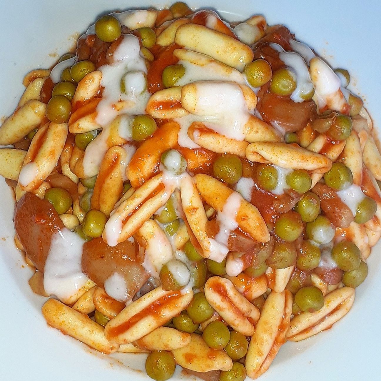 Cavatelli Con Sugo di Funghi e Piselli