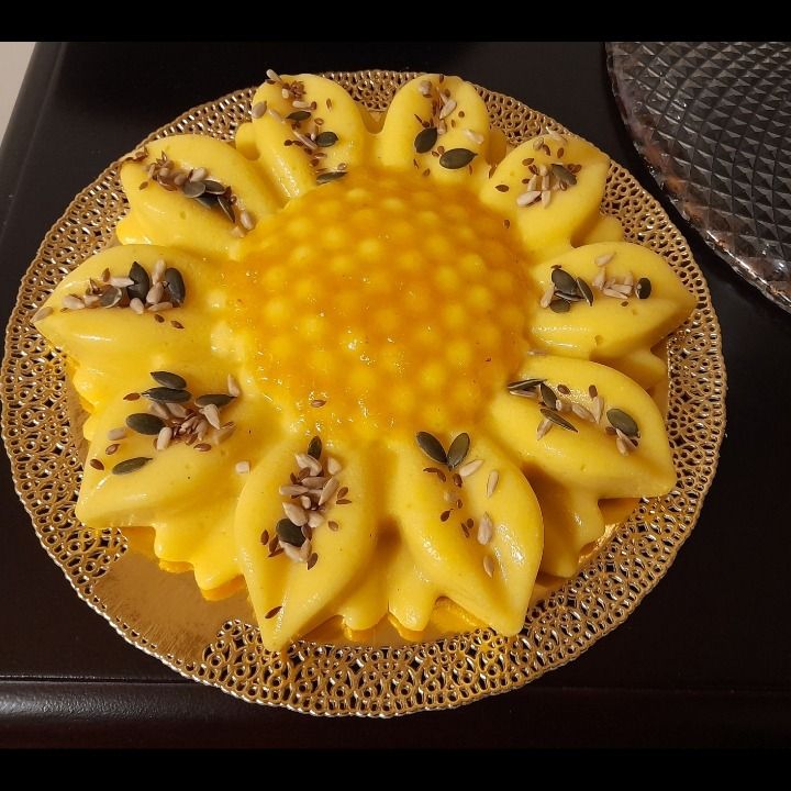 Girasole di polenta con composta mandarino e semi