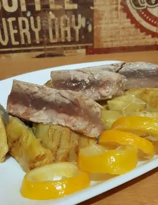 Ricetta Trancio di tonno marinato, carciofi trifolati e fette di limone caramellate di ledelizieditizy