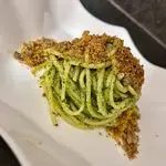 Ricetta Spaghetti al pesto di rucola con pangrattato aromatizzato alle alici
